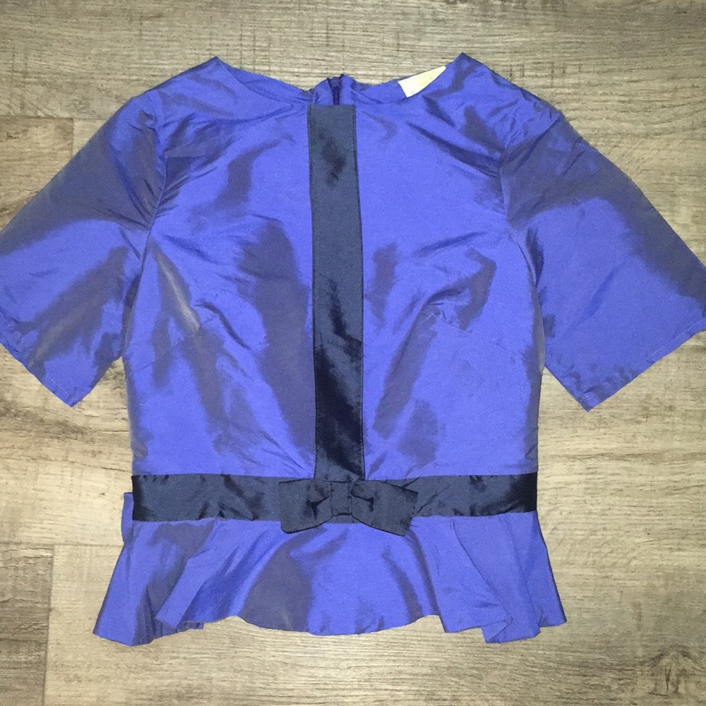 Iridescent peplum top